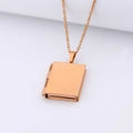 Polished rose gold heart-shaped locket pendant necklace with elegant chain on white background - Square Smooth/Rose Gold