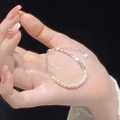 Elegant pearl bracelet with heart pendant and silver adjustable chain for women - S413 Silver
