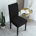 Stretchable thick black waffle knit chair cover for dining chairs in a cozy home setting - General Specification / Black