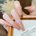 Elegant nude press-on nails in long oval shape with glossy finish and subtle shimmer - By2351 Graceful As A Startled Swan / Glue Type