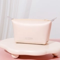 Light pink PU leather makeup bag with zip closure and gray handles in a variant view - Dumpling Bag / Beige