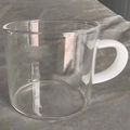 Heat-resistant borosilicate glass tea cup with a minimalist white handle - White Jade Handle