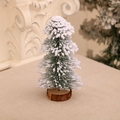 Detail of mini snow-flocked Christmas tree with green needles and natural wood base - 15*8cm (No Light)