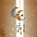 Golden moon suncatcher with blue stones and crystals casting rainbow light spots - Lapis Lazuli