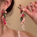 Close-up of floral tassel earrings with pink roses, white pearls and dangling metal chains - 3D Rose Flower Pearl Long Tassel (11# Silver Earring Post - Pink)