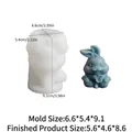 3D rabbit silicone mold for Easter candles with finished blue bunny holding a rose - Rabbit Holding Flower