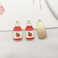 Enameled strawberry bottle charm in gold alloy for DIY jewelry and bracelets - Red Juice Bottle