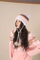 Striped knit beanie with cat ears and colorful pom-poms shown on a model - 105-Mixed Purple