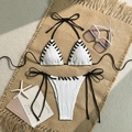 Detail of ribbed bikini set with contrast stitching and cross lace-up edges - White