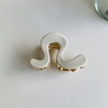 Close-up of a wavy white hair claw clip with a golden metal spring on a white backdrop - Frosted White
