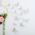 Set of 12 silver 3D hollow butterfly wall stickers in various sizes for home decoration - Style D / Silver