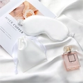 Faux silk sleep mask and pouch set in white featuring a smooth glossy finish - White