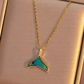 Elegant gold titanium steel necklace featuring a shimmering blue shell whale tail pendant - Gold Fishtail Shell Necklace