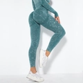 Detail of high-waisted seamless yoga pants with peach lift effect and ribbed texture - Washed Dark Green