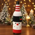 Knitted snowman wine bottle cover with red stripes and belt for Christmas table decor - Snowman Knitted Cover