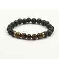 Close-up view of beaded bracelet featuring black lava stone and natural tiger eye stones with gold spacers. - Tiger's Eye