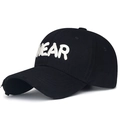 Black cotton baseball cap with white NEAR embroidery and distressed ripped brim detailing - Adjustable / Black