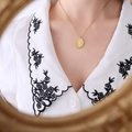 Gold oval pendant necklace with carved floral pattern worn on person near a mirror - September Flower(P1145) / 40cm+5cm / Gold