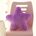 Plush purple star-shaped decorative throw pillow on chair for home decor - Purple Star