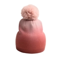 Detailed view of a pink gradient knit beanie featuring a soft and fluffy faux fur pom-pom topper - Tie-Dye Pom-Pom Knit Hat / Pink