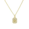 Macro detail of a square gold necklace pendant with letter D and sparkling cubic zirconia - Necklace D