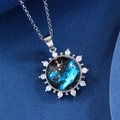 Macro shot of titanium steel planet pendant with nebula pattern and zircon stones - Silver Dreamy Planet-4