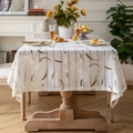 Linen rectangular tablecloth with abstract crescent strokes on a wooden dining table - Aurora Coffee