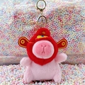 Pink capybara plush keychain with red lion dance hat and golden metal hook charm - God of Wealth Pink + Gold Clip