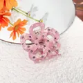 Pince à cheveux fleur en acétate marbré rose avec strass violets pour femme - Rose crème