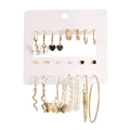 9-delige oorbellen set met goudkleurige ringen, vlinderbedeltjes en parelaccenten - Gouden 9-Paar Set - Vlinder Hart Slang Emaille
