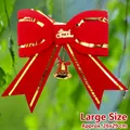 Large red Christmas bow ornament with gold Merry Christmas sign and bell, 26x29 cm - Bow-Large