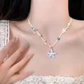 Starfish pendant necklace with blue beads and shells on an adjustable wax cord - Sea Star Shell Pendant (White)