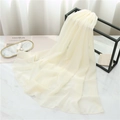Detail of light beige chiffon scarf draped over a black metal rack and marble surface - 175cmx70cm / Off White