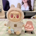 Labubu plush doll outfit in white knitted sweater and pink furry hood with chair - White Smiley Face Pin / First And Second Generation Keychains Are Compatible With La Cloth Dolls. Dolls Not Included.