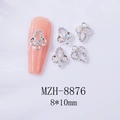 Détail macro de charmes papillon en alliage argenté avec strass pour l'art des ongles - Noeud Papillon en Strass AB Argenté (8876)