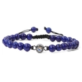 Close-up of deep blue stone beads bracelet with black woven cord and adjustable drawstring - Lapis Lazuli