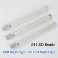 Dettaglio di tre strisce luminose USB a 24 LED con involucro in plastica trasparente - 24 LED Luce Bianca