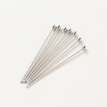Macro detail of eight polished steel ball headpins for DIY jewelry making on white background - Platinum/White Gold Ball Head Pin