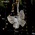Detail of butterfly Christmas ornament with champagne gold glitter on pine branch - Crystal Butterfly