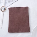 Brown knitted cashmere neck warmer shown flat with stylish accessories for winter warmth - Dark Camel
