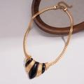 Detail of gold geometric enamel pendant with stylish flat snake chain and lobster clasp - Necklace (Gold/Black)