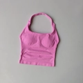 Flat lay of pink halter neck sports crop top with seamless ribbed texture and chest pads - Flower Pink