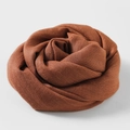 Reddish-brown cotton linen scarf in a soft floral fold for sun protection - Rust Red