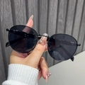 Vintage round metal sunglasses with sleek black lenses and thin frame for women - Black Frame Grey Lens