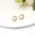 Irregular golden metal frame pearl stud earrings on a clean white display tray - Irregular Metal Frame Pearl