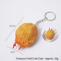 Realistic fried tempura crab claw keychain with breadcrumb texture, size 6.5x4cm - Golden Breaded Crab Claw (Keychain)