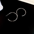 Minimalist silver hoop earrings with hammered metal texture on dark background - 3cm / Silver Needle / Silver