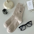 Mid-calf beige speckled rib-knit socks featuring delicate black embroidered bows - One Size / Oatmeal