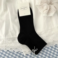 Chaussettes hautes noires en coton côtelé pour femmes avec boucle nœud argentée chic - Taille unique / Noir