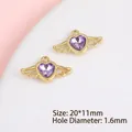 Macro view of gold-plated wing heart charms with purple faceted stones for DIY jewelry - Angel Wing Heart / Gold Purple Zirconia